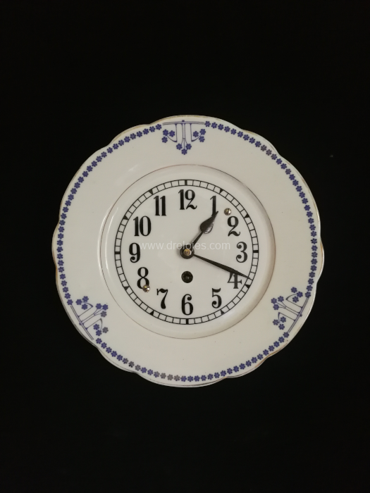 Reloj de porcelana